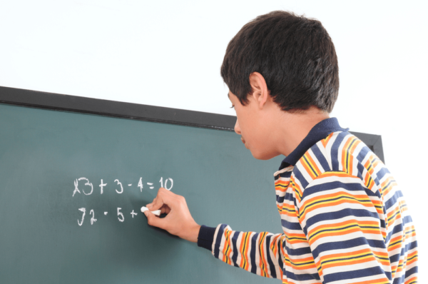 Boy Completing Math